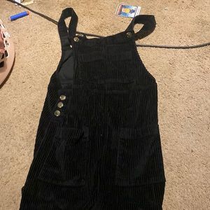 it’s a corduroy super freaking cute!! worn once